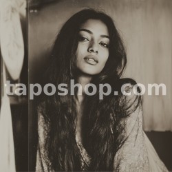 Retro Polaroid Portrait – Indian Woman in 70s Cinematic Style