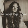 Retro Polaroid Portrait – Indian Woman in 70s Cinematic Style